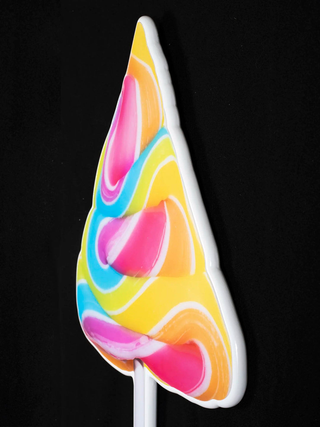 bright pink, blue and yellow lollipop - photographic sculpture wall art by Rory Fink – limited edition shaped print close up detail 1