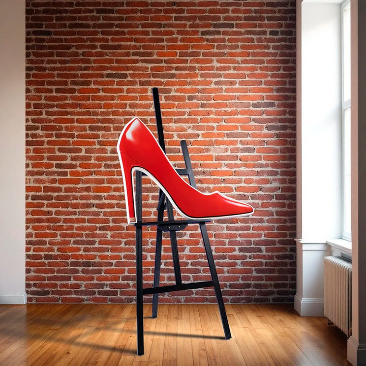 Red high heel photographic wall sculpture by Rory Fink – fashion pop art sitting on easel