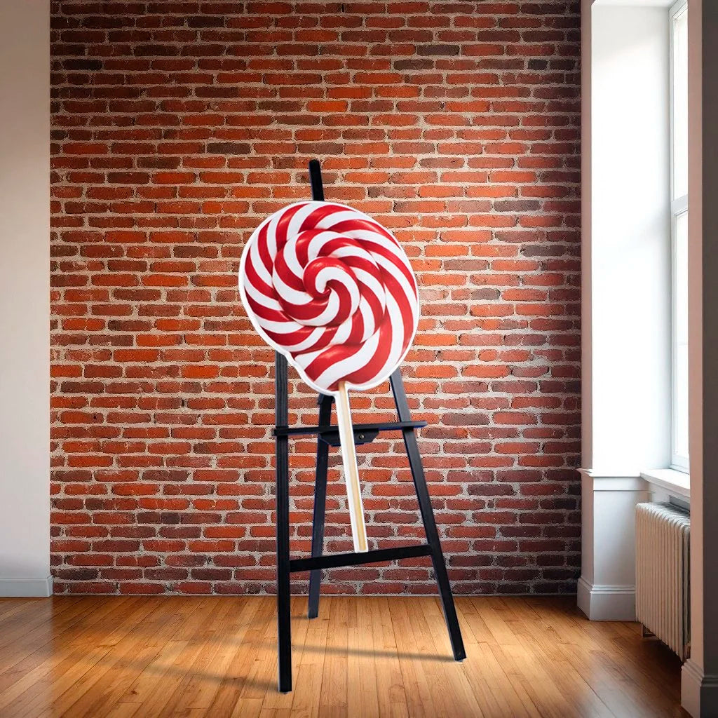 Red and white lollipop - photographic sculpture wall art by Rory Fink – limited edition shaped print sitting on easel